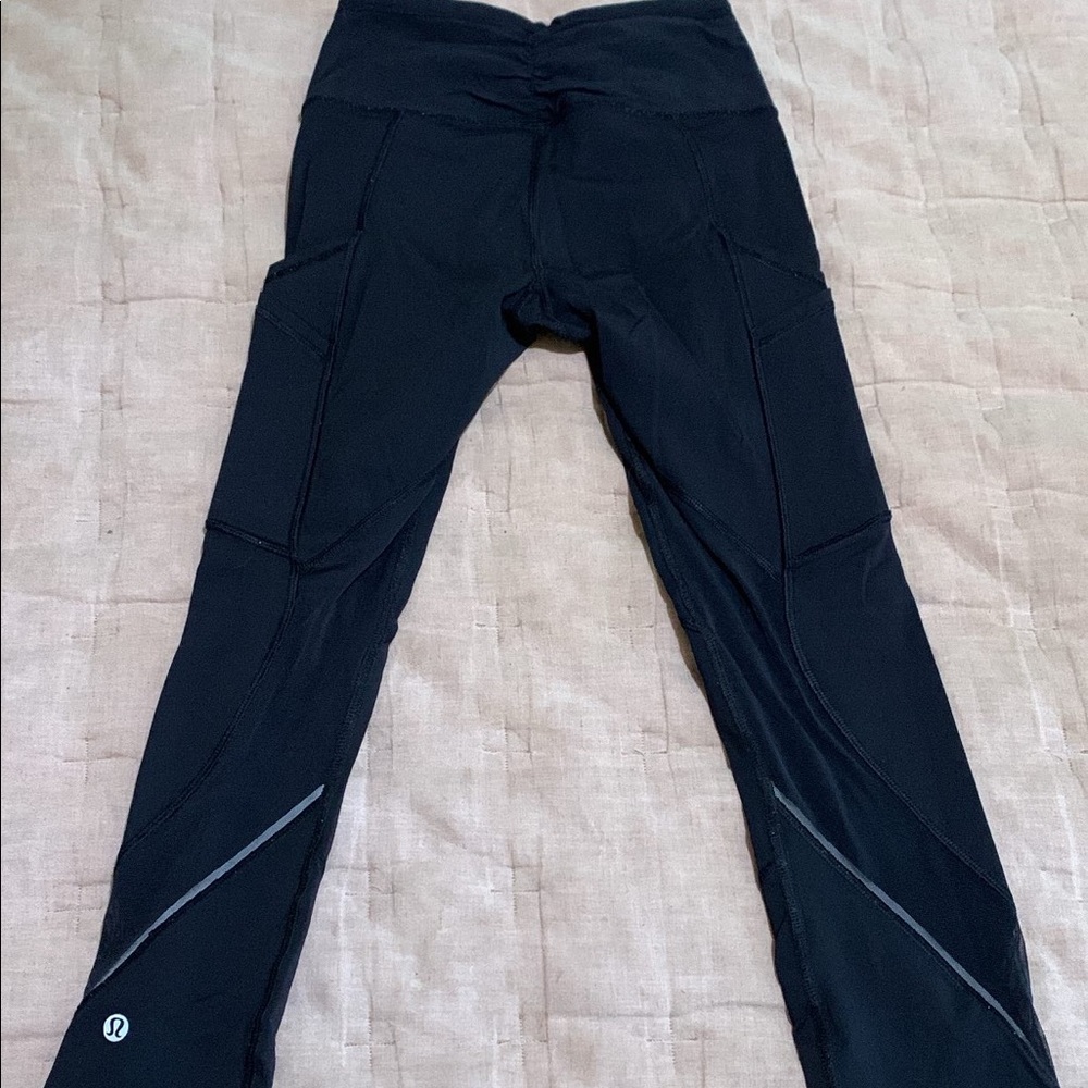 Lululemon black mesh running tights, size 0
